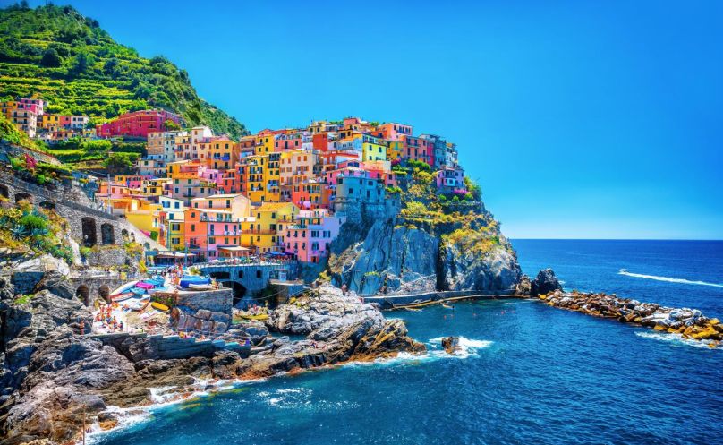 visit the four villages of Riomaggiore, Manarola, Vernazza & Corniglia